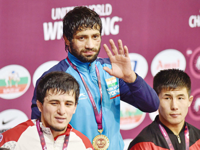 Read more about the article Asian Wrestling Championships: Ravi Dahiya wins gold, Bajran Punia settles for silver.